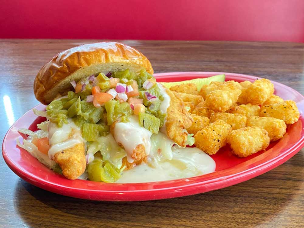 3 chicken tenders topped with grilled Hatch Peppers, country gravy